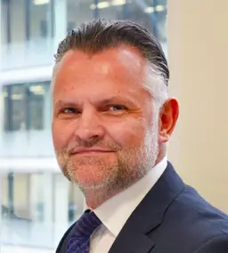 Bill Prew, CEO - INDOS Financial